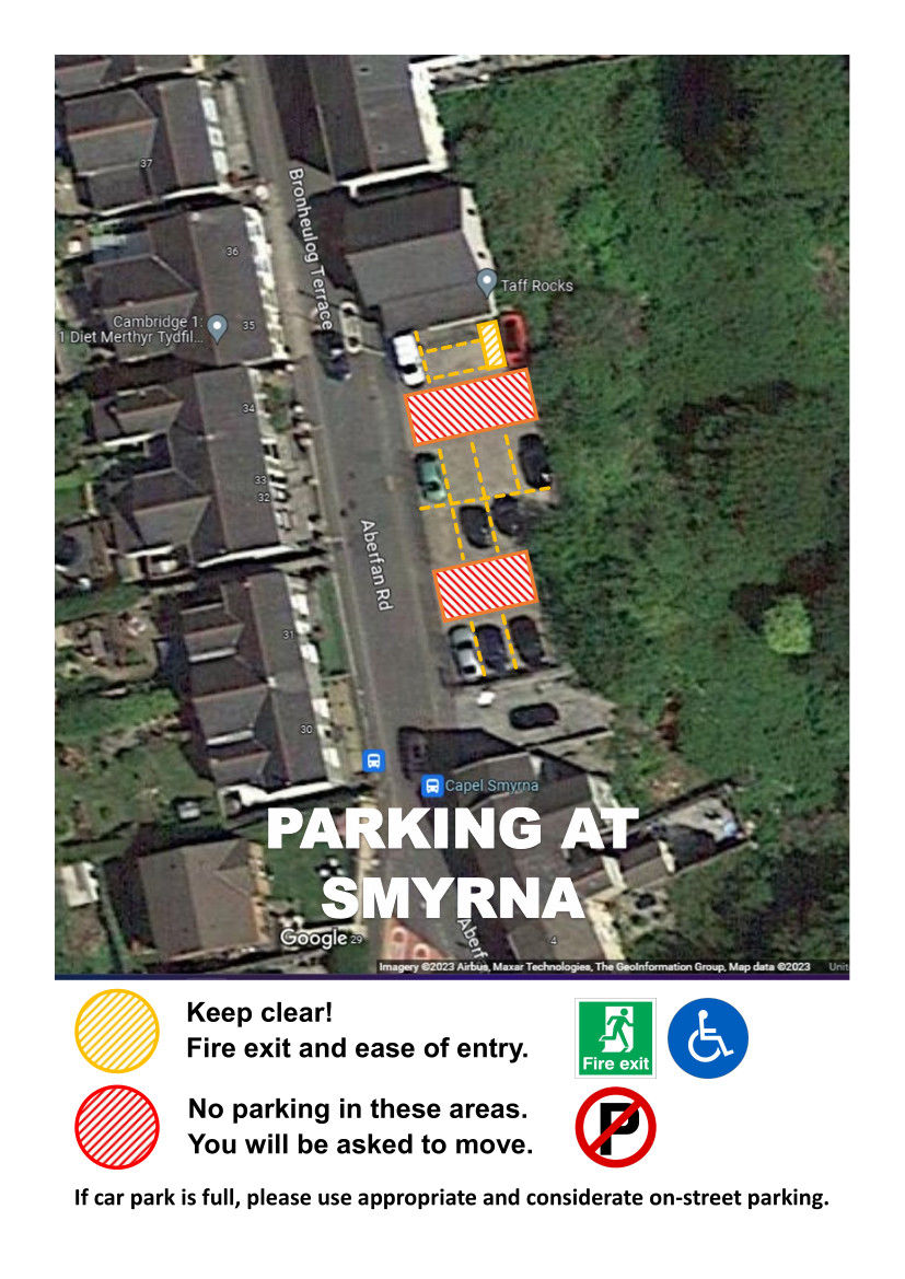 Aerial view showing a parking layout at Smyrna. Yellow striped areas indicate fire exits, red striped areas mark no-parking zones, noted for accessibility needs.